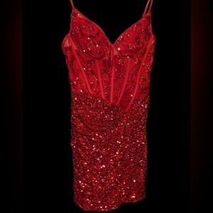 Stacees Red Sequin Mini Dress with front slit, built in pads, spaghetti strap.